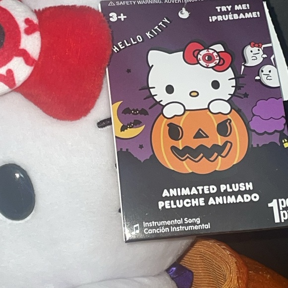Animated Hello Kitty Halloween plush in pumpkin
